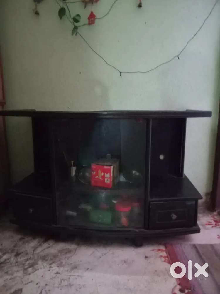 TV Cabinet and Round Glass Tea Table