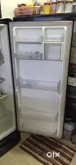 235ltr LG refrigerator black color running condition ok pc