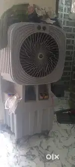 The cooler is in white colour and it is in very good condition it is