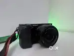 Sony a6300 camera with kit lens, Sigma 16mm f1.4, tTartisan 49mm f1.2