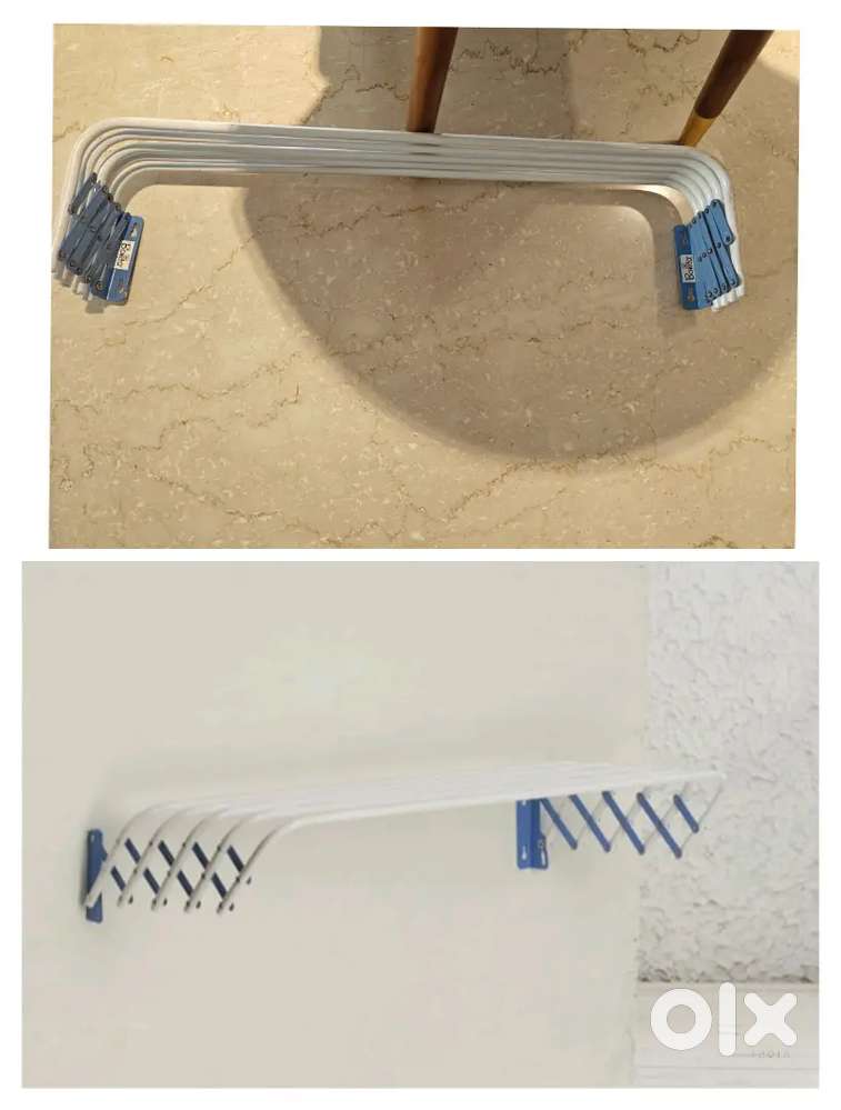 Foldable wall hung clothes stand