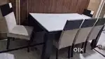 Marble table nd wooden 6 chairs