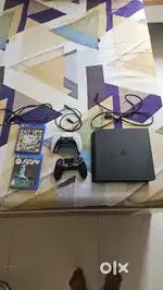 PS4 SLIM 1TB WITH PS4 AND PS5 CONTROLLER WITH FC24 AND GTA 5