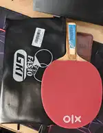GKI TT racquet with ball