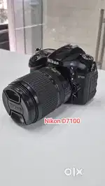 Nikon d7100 dslr camera with 18-140mm lens Original battery charger.