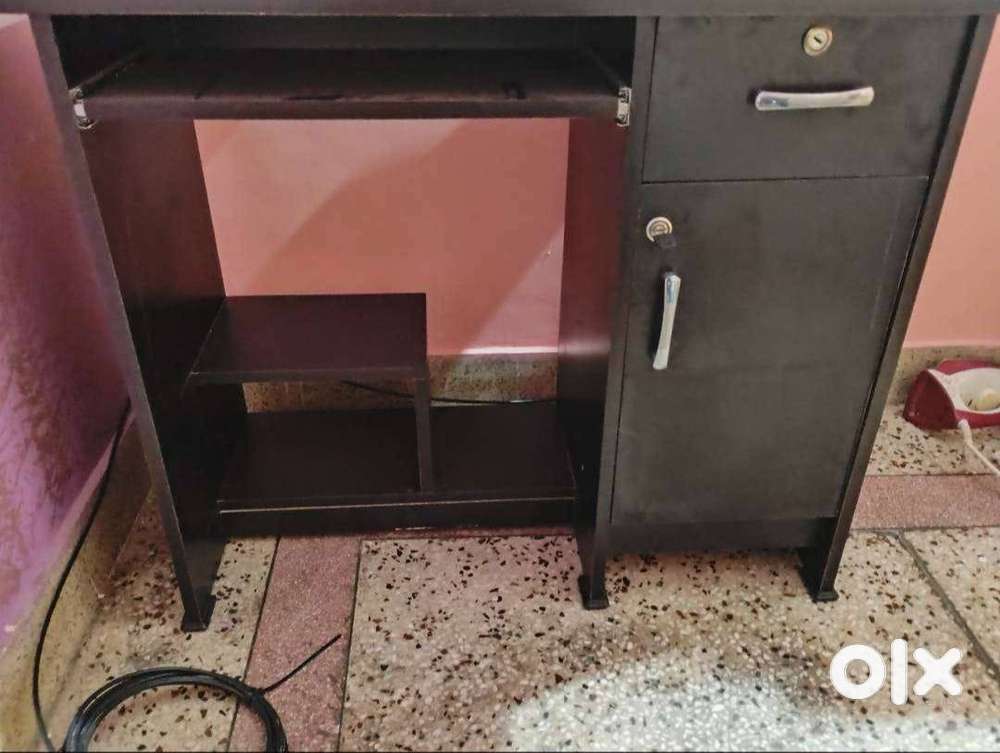 New Computer Table and Chair and an old Almirah