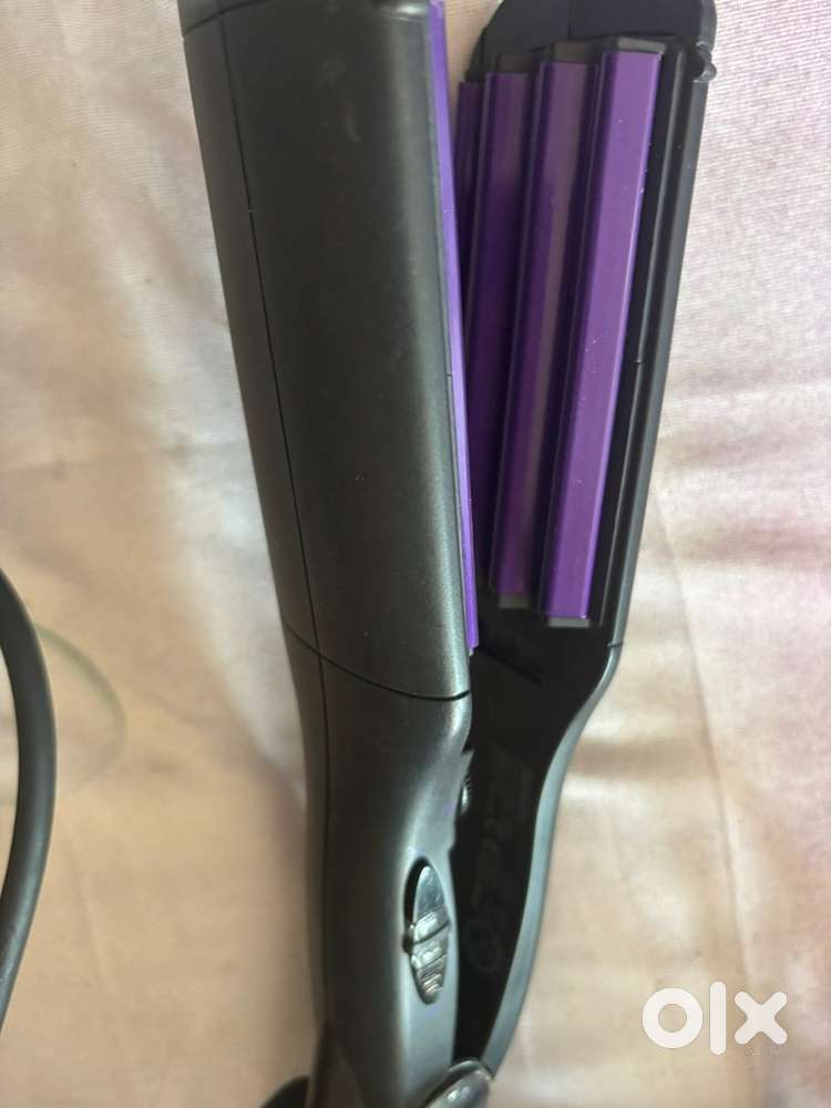 Crimper and hair straightner