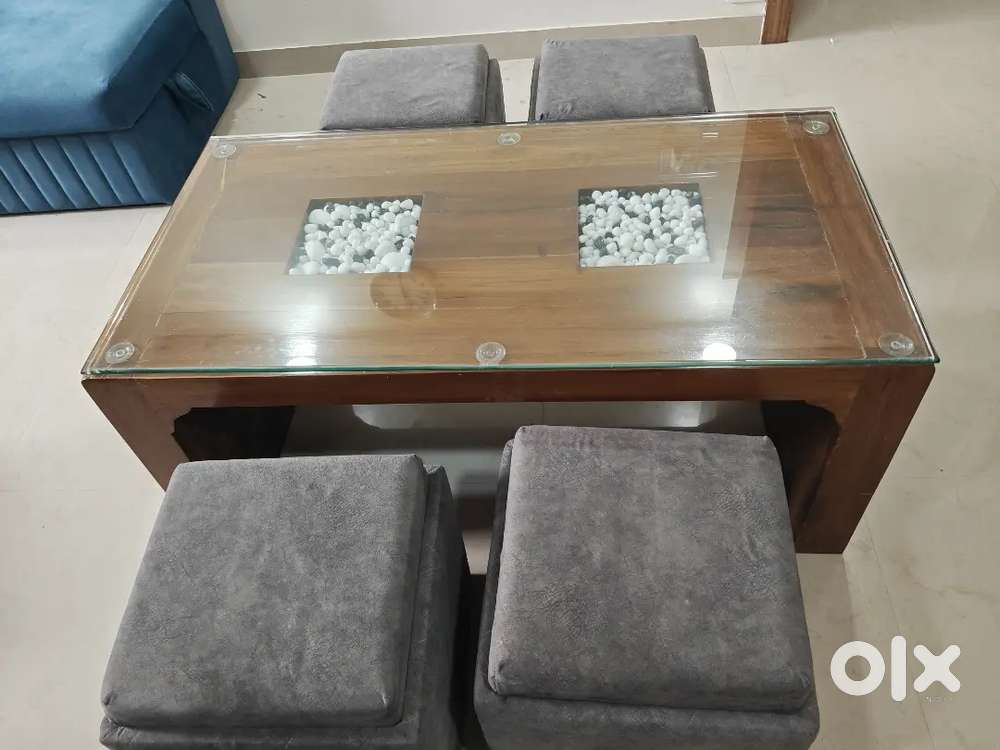 Centre table cum dining table with puffies having storage