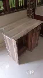 One computer table and one table with boxes