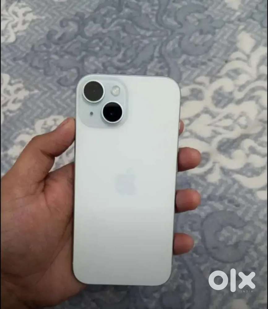 Selling my 4 months old I phone 15 in white colour/.Need urgent money