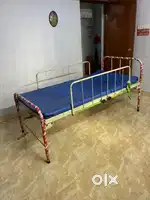 Bed with railings