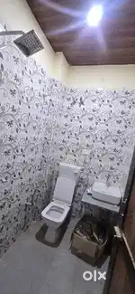 A room with an attached bathroom is available.