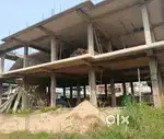 Land with building under construction
