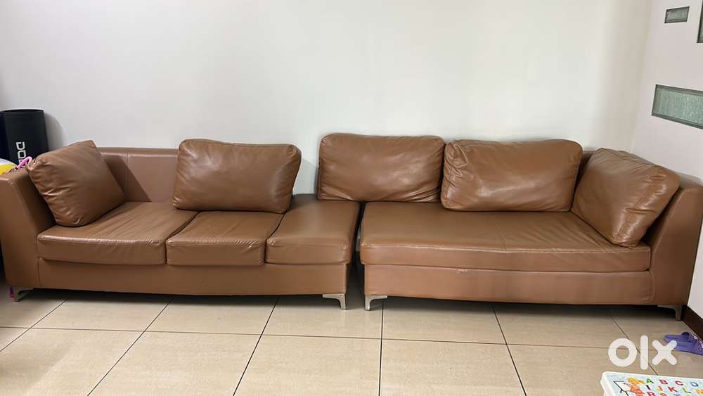 Designer sofa in brown leatherette