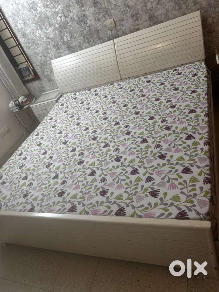 Double bed with aode table