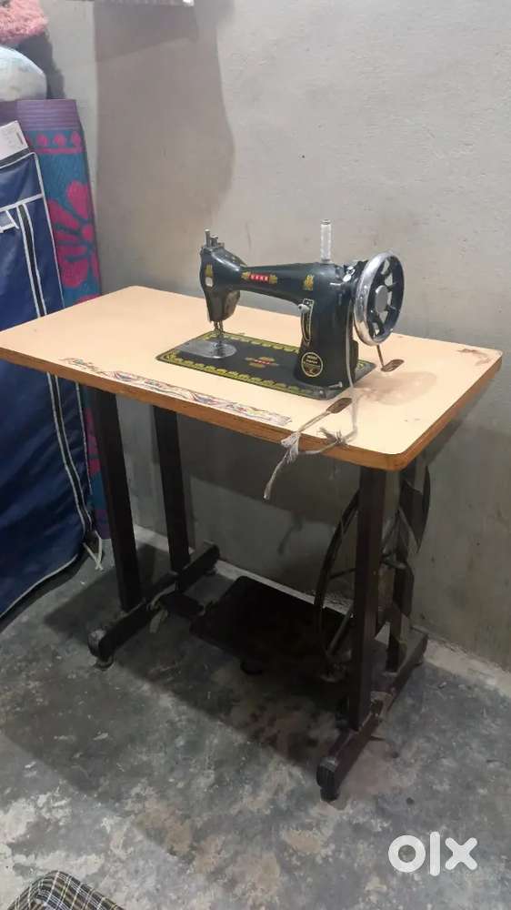 Usha sewing machine  Almost new Condition with Pedel table