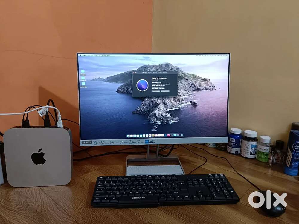 Apple Mac mini desktop computer with monitor keyboard and mouse