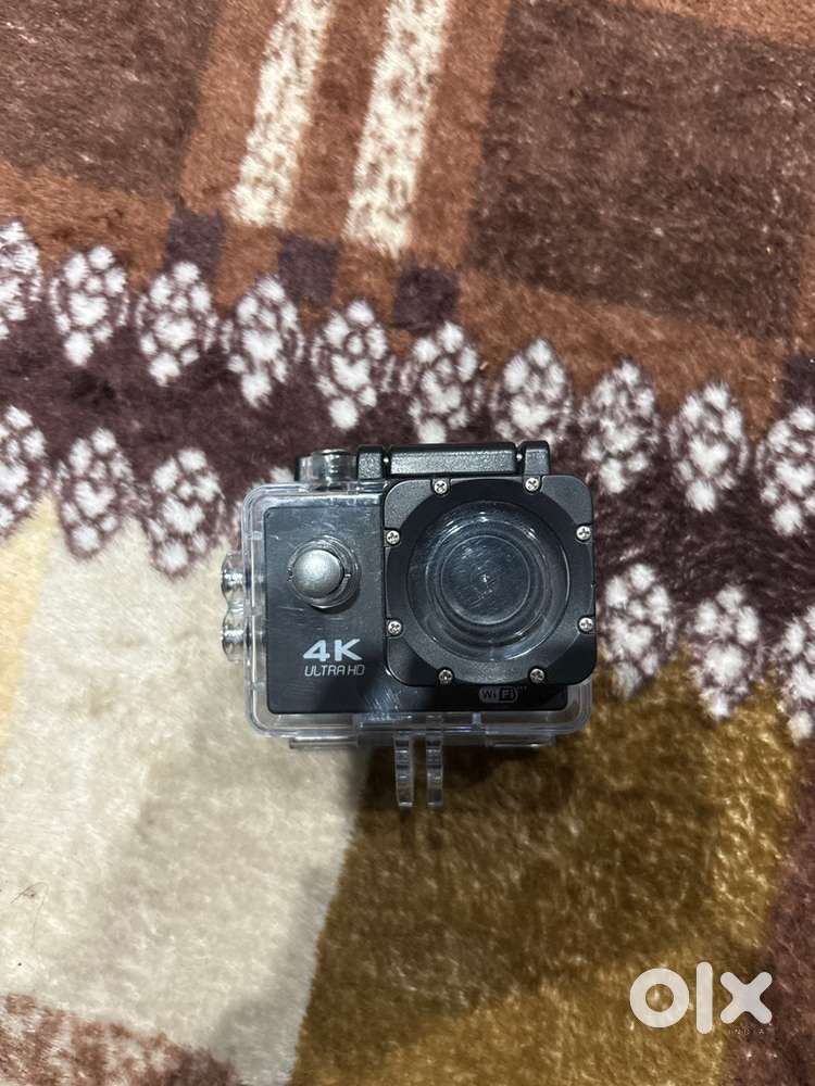 Action camera with helmet mount