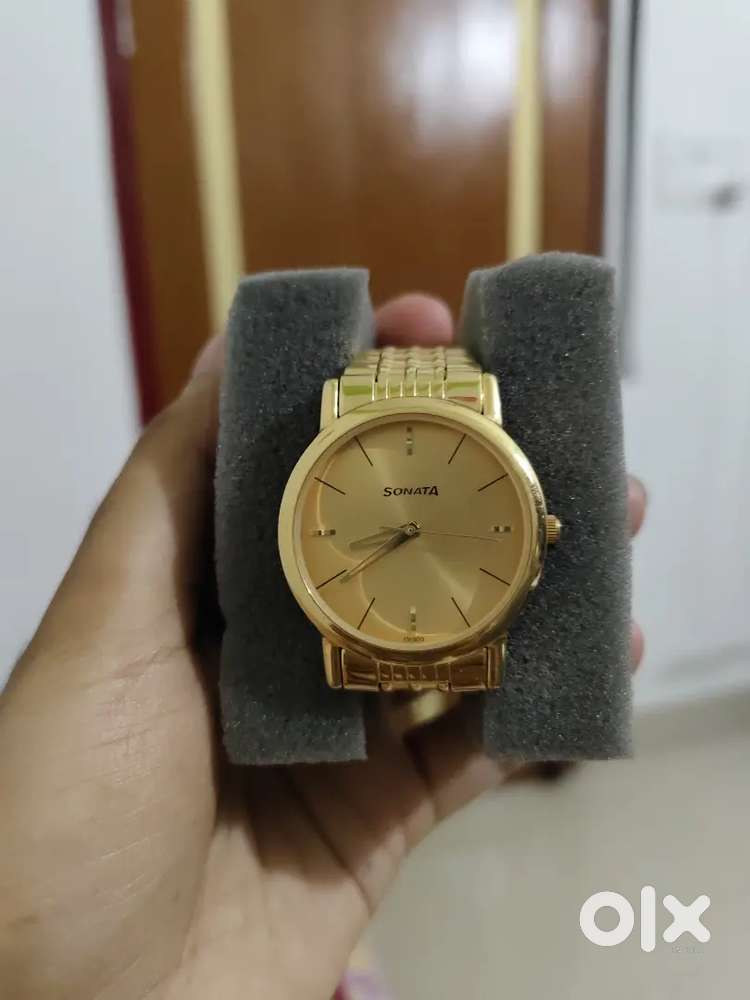 Sonata golden watch