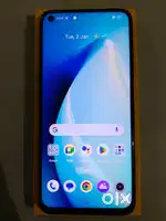 Realme 9i with original charger.