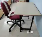 Wooden table and revolving office chair