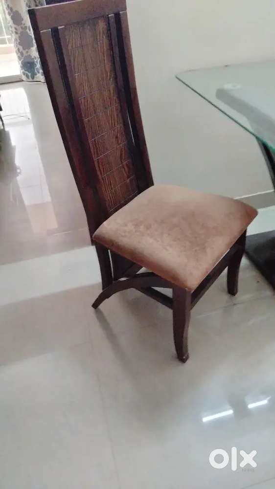 4seater dining table with extended glass for 5 persons