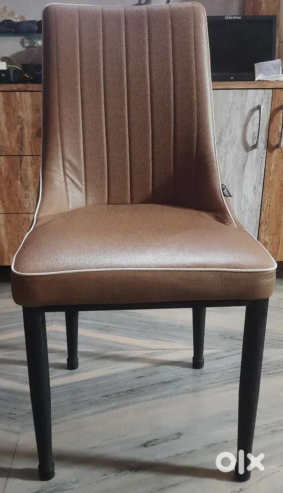 FOUR NOS CHAIR OF IRONY