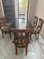 Teak wood dining table with 6 chairs very good condition