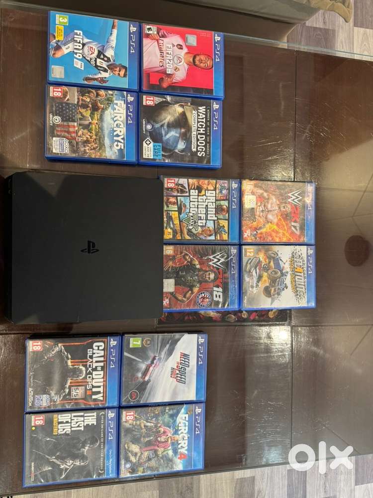 Ps4 slim 500 gb 2 wireless controllers 1 gaming headphones 12 games
