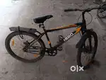 Hero orange bicycle