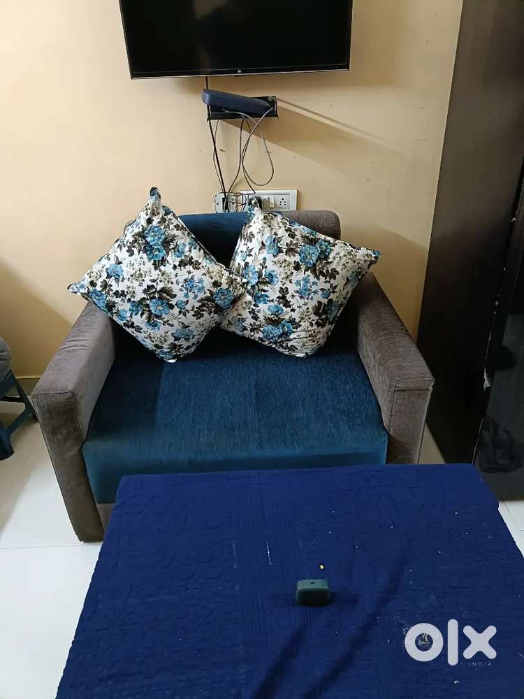 Two seater fabric sofa very gud condition home made