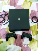 Selling ps4 pro 1tb with 2 controller