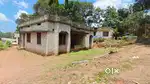 Land with house under construction for sale