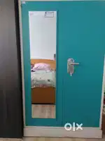 Steel cupboard with mirror