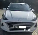 Hyundai Grand i10 Nios Sportz MT While Color in excellent condition