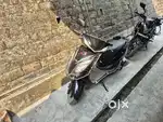 Electric Scooty  60 km Range  40 km/h  11,000

km
