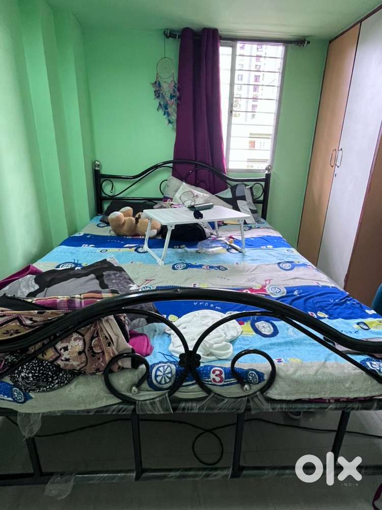 Stainless steel bed with queen size mattress