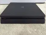 Sony PS4 Slim 1TB, 2 Original DualShock Controllers and 5 Games