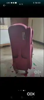 Trolley suitcase red colour