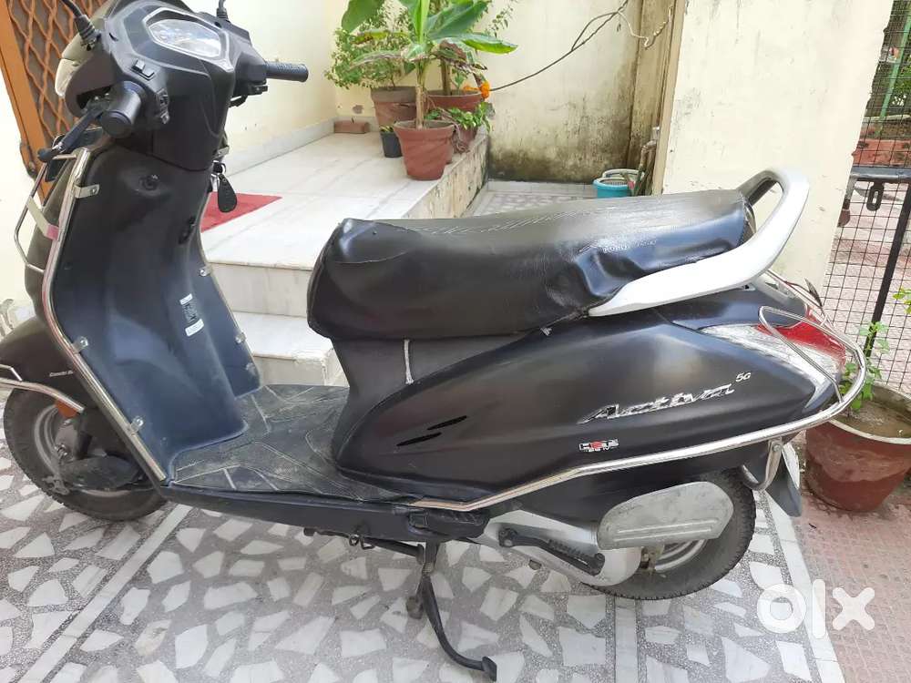 Best condition ,New Activa 5g dark grey
