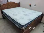 Original Teak wood cot and Nilkamal mattress for immediate sale .n