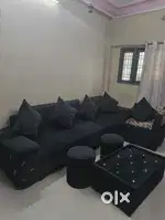 L size sofa full set with center table colour black and good
