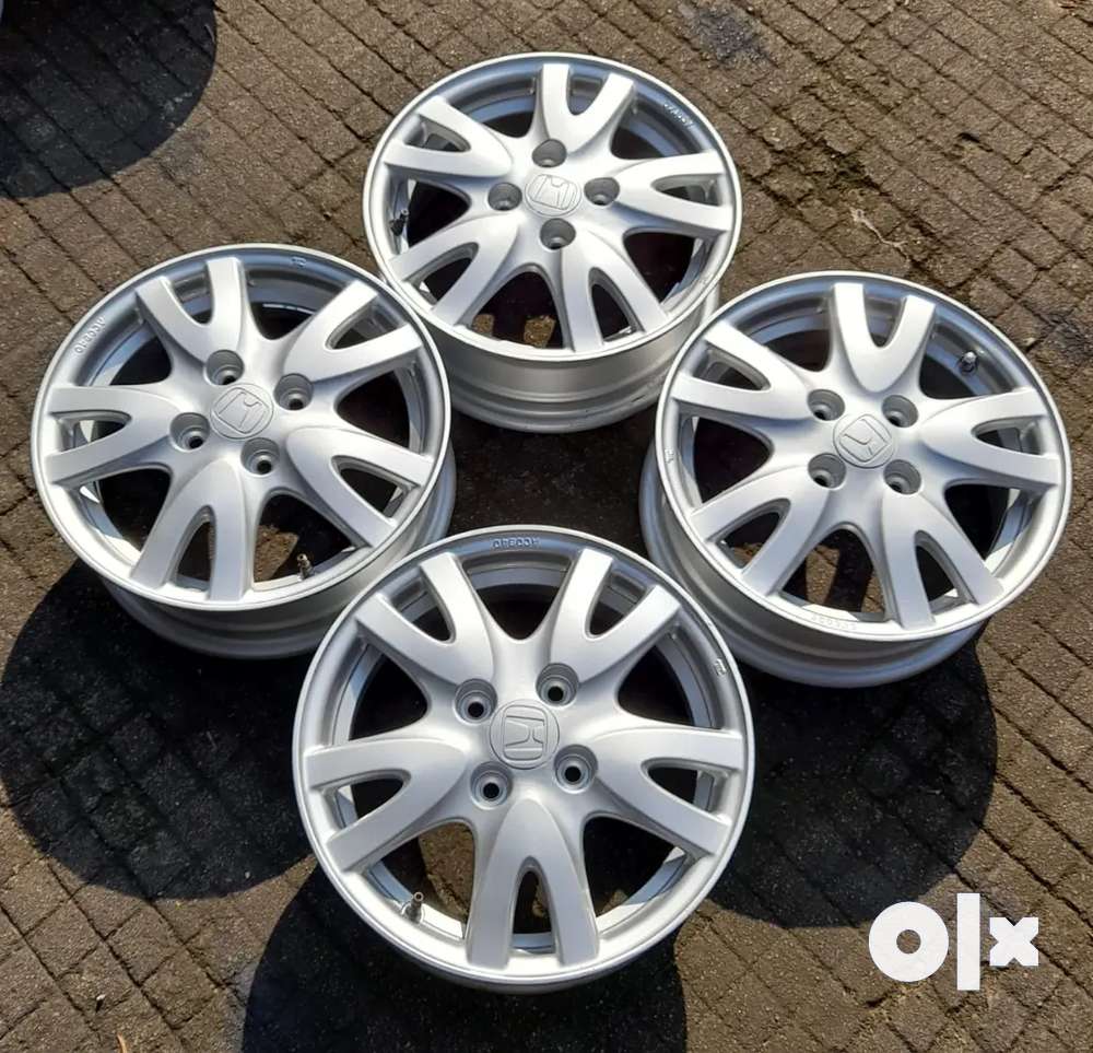 14 inch less used alloys 100 pcd 4 holes.