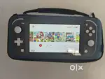 Nintendo switch lite with 256gb card inbuilt 35 plus