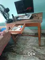 Wooden table and plastic chairs (can be bought separately)