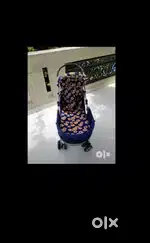 Extremely good condition Blue Coloured Pram with hood and rear brakes