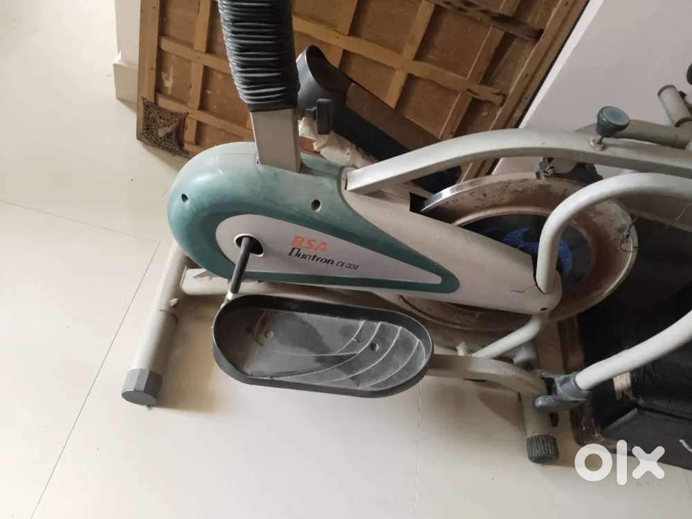 Sofa tv stand and exercise cycle