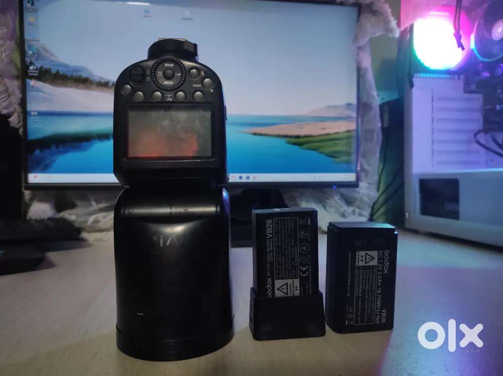 Godox v1 sony flash, charger and 2 battery for sale