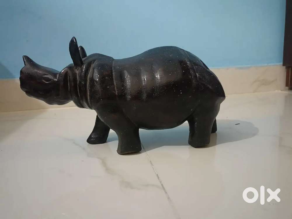 antique rhino figure