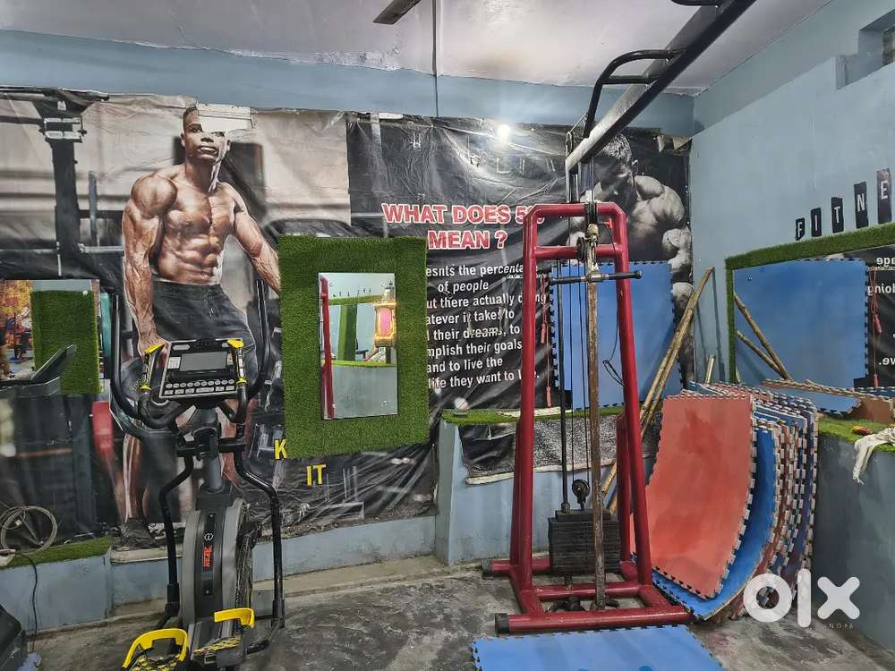 Full gym setup with mirror nd fans nd lights